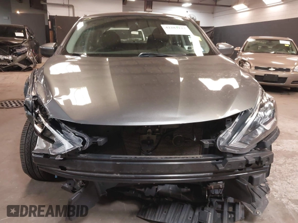 2019 Nissan Sentra S z VIN 3N1AB7AP3KY368736, wystawiony jako IAAI lot #42283123 z przebiegiem 89 117 mil mil oraz . Historia ofert i sprzedaży dostępna na DreamBid. Obrazek 6.