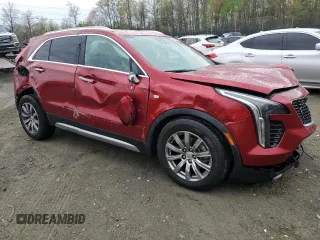 2021 Cadillac XT4 FWD Premium Luxury with VIN 1GYFZCR40MF011603, listed as a Copart auction lot 53068825 with 84,919 mi miles and Salvage title. Bid and sale history available at DreamBid. Image 4.