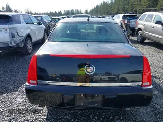2006 Cadillac DTS 1SC z VIN 1G6KD57YX6U100634, wystawiony jako IAAI lot #41671007 z przebiegiem Nie podano mil oraz . Historia ofert i sprzedaży dostępna na DreamBid. Obrazek 16.