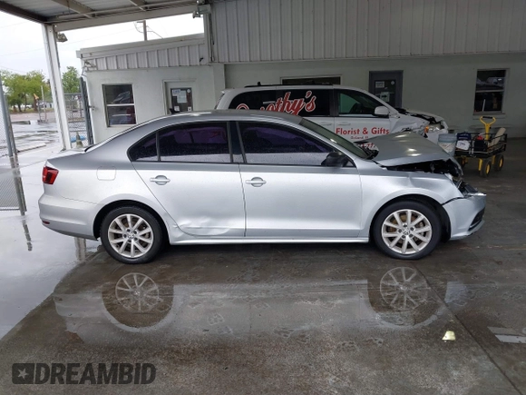 2016 Volkswagen Jetta Sedan 1.4T SE with VIN 3VWD67AJ2GM252658, listed as a IAAI auction lot 41757319 with 147,483 mi miles. Bid and sale history available at carsss.com. Image 13.