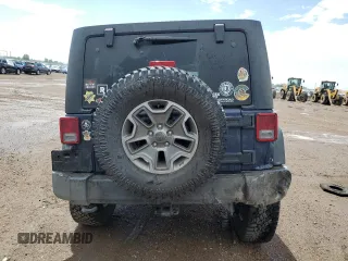 2013 Jeep Wrangler Unlimited Rubicon with VIN 1C4BJWFG5DL572795, listed as a Copart auction lot 62132425 with 149,695 mi miles and Salvage title. Bid and sale history available at DreamBid. Image 6.