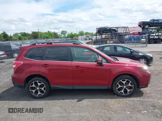 2014 Subaru Forester XT Touring with VIN JF2SJGMC1EH500150, listed as a IAAI auction lot 42201409 with 106,728 mi miles and . Bid and sale history available at DreamBid. Image 13.
