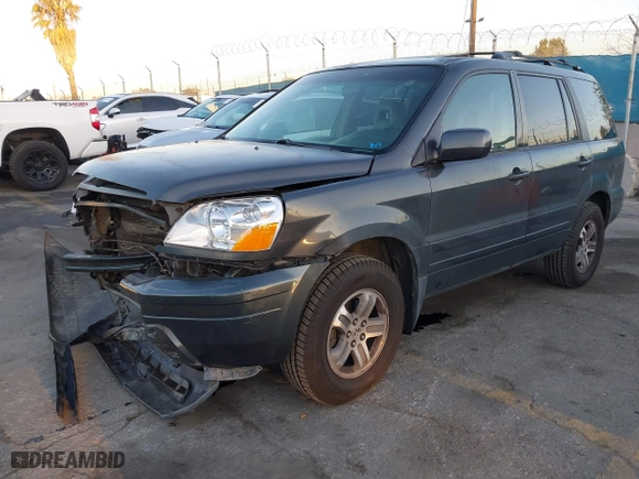 2005 Honda Pilot EX-L with NAVI with VIN 2HKYF187X5H514571, listed as a IAAI auction lot 41746538 with 276,994 mi miles. Bid and sale history available at carsss.com. Image 19.
