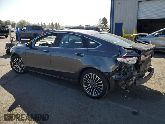 2018 Ford Fusion Titanium with VIN 3FA6P0D95JR188357, listed as a Copart auction lot 55994895 with 123,214 mi miles and Salvage title. Bid and sale history available at DreamBid. Image 2.