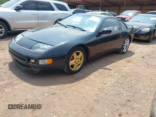 1990 Nissan 300ZX z VIN JN1RZ24AXLX016264, wystawiony jako IAAI lot #42389421 z przebiegiem 144 803 mil mil oraz . Historia ofert i sprzedaży dostępna na DreamBid. Obrazek 2.