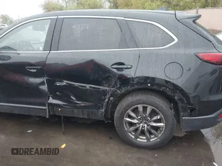 2016 Mazda CX-9 Touring with VIN JM3TCBCY5G0101490, listed as a IAAI auction lot 42062846 with 85,352 mi miles and . Bid and sale history available at DreamBid. Image 6.