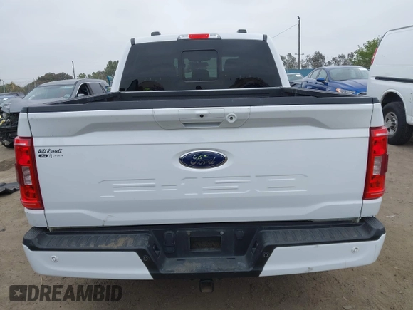 2022 Ford F-150 XL with VIN 1FTFW1E57NKE14424, listed as a IAAI auction lot 42097712 with 56,879 mi miles and . Bid and sale history available at DreamBid. Image 16.