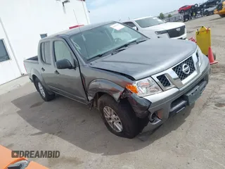2019 Nissan Frontier SV z VIN 1N6AD0EV7KN787772, wystawiony jako IAAI lot #42207613 z przebiegiem 81 470 mil mil oraz . Historia ofert i sprzedaży dostępna na DreamBid. Obrazek 1.
