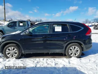 2014 Honda CR-V EX-L with VIN 2HKRM4H76EH659957, listed as a IAAI auction lot 41310681 with 256,784 mi miles. Bid and sale history available at carsss.com. Image 14.