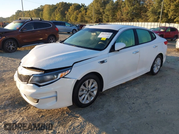 2018 Kia Optima LX with VIN 5XXGT4L32JG265716, listed as a IAAI auction lot 40645411 with 112,305 mi miles and . Bid and sale history available at DreamBid. Image 17.
