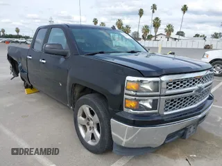 2014 Chevrolet Silverado 1500 LT with VIN 1GCRCREC4EZ299906, listed as a IAAI auction lot 41988540 with 86,975 mi miles and . Bid and sale history available at DreamBid. Image 1.