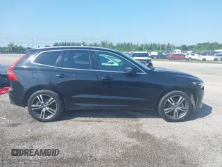 2021 Volvo XC60 Momentum z VIN YV4102DK2M1715161, wystawiony jako IAAI lot #42096448 z przebiegiem 57 784 mil mil oraz . Historia ofert i sprzedaży dostępna na DreamBid. Obrazek 14.