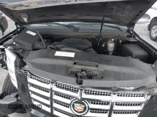 2009 Cadillac Escalade z VIN 1GYFC23249R116363, wystawiony jako IAAI lot #39887498 z przebiegiem 140 095 mil mil oraz . Historia ofert i sprzedaży dostępna na DreamBid. Obrazek 10.