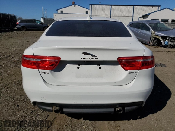 2019 Jaguar XE 25t with VIN SAJAR4FX8KCP52067, listed as a Copart auction lot 76584654 with 82,069 mi miles and Salvage Title. Bid and sale history available at carsss.com. Image 6.
