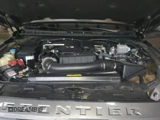 2022 Nissan Frontier Pro-4X z VIN 1N6ED1EK8NN638918, wystawiony jako Copart lot #61012615 z przebiegiem 59 297 mil mil oraz Szkoda całkowita • Salvage title. Historia ofert i sprzedaży dostępna na DreamBid. Obrazek 11.