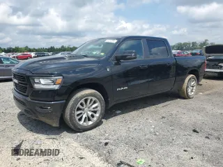 2023 Ram 1500 Laramie with VIN 1C6SRFRT1PN577199, listed as a Copart auction lot 64833895 with 22,119 mi miles and Salvage title. Bid and sale history available at DreamBid. Image 1.