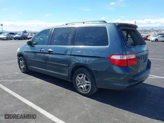 2005 Honda Odyssey EX-L with VIN 5FNRL38735B057514, listed as a IAAI auction lot 41762185 with 264,851 mi miles. Bid and sale history available at carsss.com. Image 3.