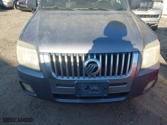 2008 Mercury Mariner with VIN 4M2CU81178KJ06737, listed as a IAAI auction lot 41638001 with 143,895 mi miles. Bid and sale history available at carsss.com. Image 6.
