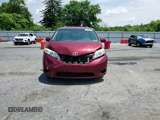 2013 Toyota Sienna LE AAS with VIN 5TDKK3DC4DS404544, listed as a Copart auction lot 60274615 with 94,933 mi miles and Salvage title. Bid and sale history available at DreamBid. Image 14.