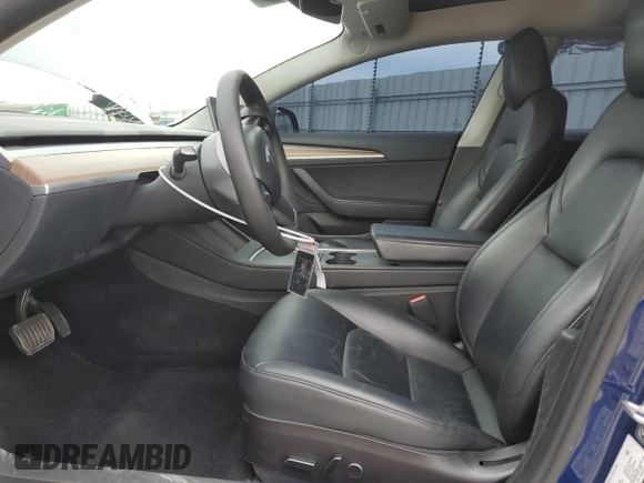 2023 Tesla Model 3 Long Range with VIN 5YJ3E1EB0PF388986, listed as a Copart auction lot 49823045 with 93,870 mi miles and Salvage Title. Bid and sale history available at DreamBid. Image 7.