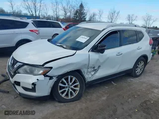 2017 Nissan Rogue S with VIN JN8AT2MVXHW017964, listed as a IAAI auction lot 41869965 with 123,544 mi miles. Bid and sale history available at carsss.com. Image 2.