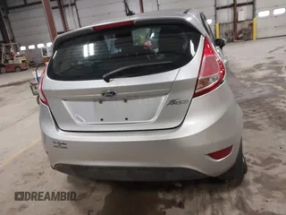 2015 Ford Fiesta S z VIN 3FADP4TJ7FM220448, wystawiony jako IAAI lot #41688114 z przebiegiem 43 779 mil mil oraz . Historia ofert i sprzedaży dostępna na DreamBid. Obrazek 16.