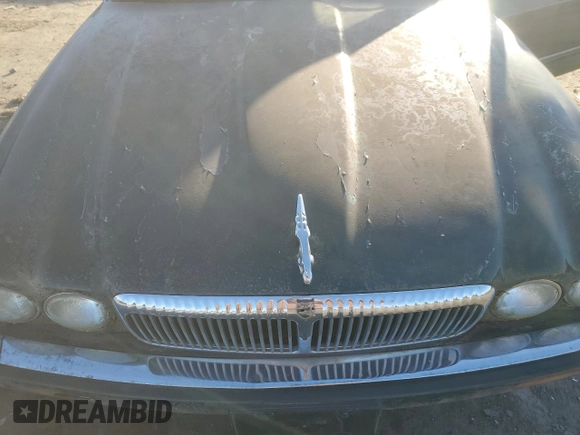 1995 Jaguar XJ with VIN SAJKX1747SC722815, listed as a Copart auction lot 83743934 with Not Provided miles and Clean Title. Bid and sale history available at DreamBid. Image 11.