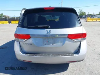 2014 Honda Odyssey EX-L with VIN 5FNRL5H63EB041106, listed as a IAAI auction lot 42294113 with 122,610 mi miles and . Bid and sale history available at DreamBid. Image 17.