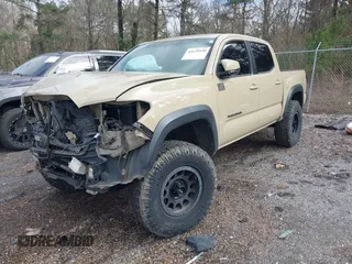 2017 Toyota Tacoma SR5 with VIN 5TFCZ5AN8HX076997, listed as a IAAI auction lot 41639530 with 93,328 mi miles and . Bid and sale history available at DreamBid. Image 2.
