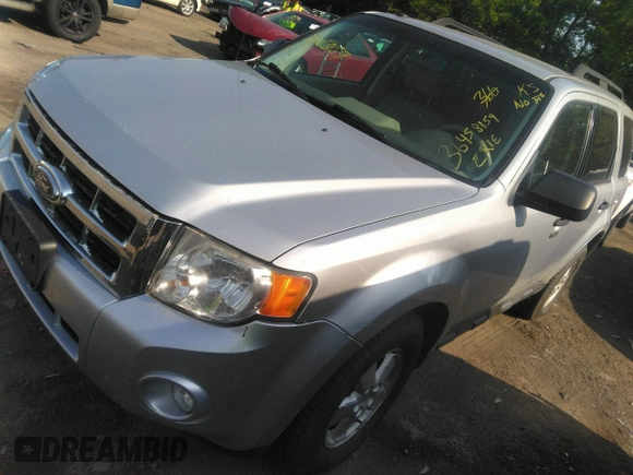 2011 Ford Escape XLT with VIN 1FMCU9DG2BKA63519, listed as a IAAI auction lot 36458159 with 168,475 mi miles. Bid and sale history available at carsss.com. Image 2.