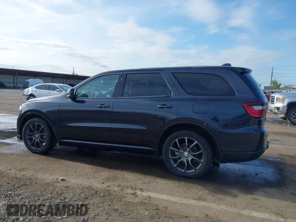 2015 Dodge Durango R/T with VIN 1C4SDJCT1FC188401, listed as a IAAI auction lot 42124652 with 86,339 mi miles and . Bid and sale history available at carsss.com. Image 14.