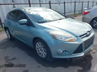 2012 Ford Focus SE with VIN 1FAHP3K24CL394495, listed as a IAAI auction lot 42034167 with 66,833 mi miles and . Bid and sale history available at carsss.com. Image 1.