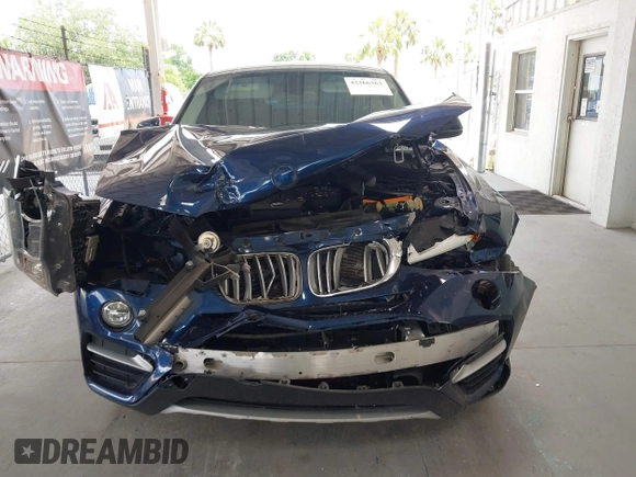 2015 BMW X4 xDrive28i with VIN 5UXXW3C51F0M87268, listed as a IAAI auction lot 42366363 with 143,285 mi miles and . Bid and sale history available at DreamBid. Image 13.