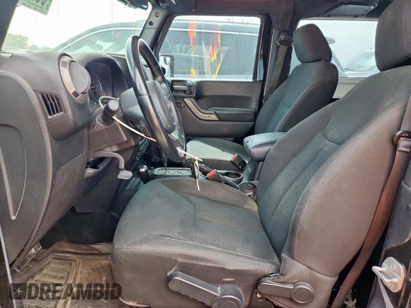 2016 Jeep Wrangler Black Bear with VIN 1C4AJWAG6GL332985, listed as a Copart auction lot 55244945 with 76,661 mi miles and Salvage title. Bid and sale history available at DreamBid. Image 7.