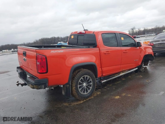 2019 Chevrolet Colorado 4WD ZR2 with VIN 1GCGTEEN1K1160280, listed as a IAAI auction lot 41166240 with 71,529 mi miles. Bid and sale history available at carsss.com. Image 4.