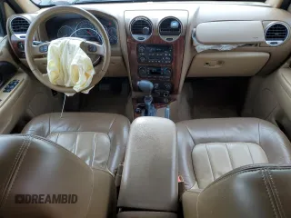 2003 GMC Envoy SLT z VIN 1GKET16P936191818, wystawiony jako Copart lot #53270645 z przebiegiem 130 357 mil mil oraz Szkody całkowita. Historia ofert i sprzedaży dostępna na DreamBid. Obrazek 8.