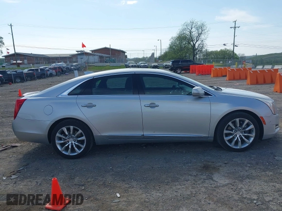 2016 Cadillac XTS Luxury Collection z VIN 2G61M5S33G9107107, wystawiony jako IAAI lot #42072608 z przebiegiem 130 542 mil mil oraz . Historia ofert i sprzedaży dostępna na DreamBid. Obrazek 13.