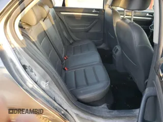 2009 Volkswagen Jetta z VIN 3VWAL71K09M133238, wystawiony jako Copart lot #81069654 z przebiegiem 153 617 mil mil oraz Szkoda całkowita • Salvage title. Historia ofert i sprzedaży dostępna na DreamBid. Obrazek 10.