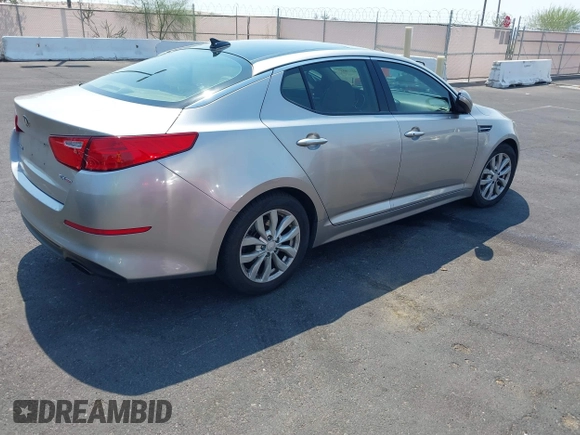 2015 Kia Optima EX with VIN 5XXGN4A75FG444341, listed as a IAAI auction lot 42738557 with 140,714 mi miles and . Bid and sale history available at DreamBid. Image 4.