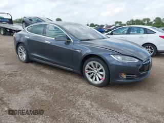 2016 Tesla Model S 90D with VIN 5YJSA1E25GF129482, listed as a IAAI auction lot 42588913 with 101,790 mi miles and . Bid and sale history available at DreamBid. Image 1.