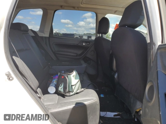 2015 Subaru Forester XT Touring with VIN JF2SJGUC4FH452824, listed as a Copart auction lot 56219615 with 127,328 mi miles and Salvage title. Bid and sale history available at DreamBid. Image 11.