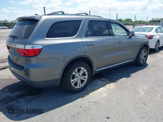 2011 Dodge Durango Crew with VIN 1D4SE4GT5BC639156, listed as a IAAI auction lot 42147490 with 204,285 mi miles and . Bid and sale history available at carsss.com. Image 4.