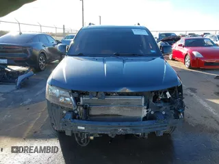 2019 Dodge Journey SE with VIN 3C4PDCBG7KT872888, listed as a IAAI auction lot 41390094 with 114,513 mi miles and . Bid and sale history available at DreamBid. Image 13.
