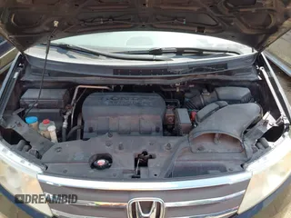 2011 Honda Odyssey EX-L with VIN 5FNRL5H62BB063125, listed as a IAAI auction lot 42562541 with 140,787 mi miles and . Bid and sale history available at DreamBid. Image 10.