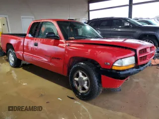 1999 Dodge Dakota SLT with VIN 1B7GL22X4XS210675, listed as a Copart auction lot 85746454 with 203,884 mi miles and Salvage Title. Bid and sale history available at carsss.com. Image 4.