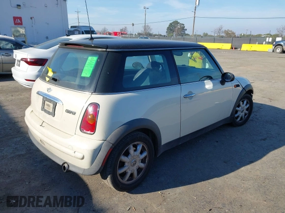 2003 MINI Hardtop with VIN WMWRC33433TE14150, listed as a IAAI auction lot 41313860 with 209,684 mi miles and . Bid and sale history available at DreamBid. Image 4.