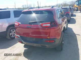 2016 Jeep Cherokee Trailhawk with VIN 1C4PJMBS9GW237059, listed as a IAAI auction lot 42079788 with 114,513 mi miles. Bid and sale history available at carsss.com. Image 17.