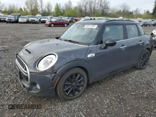 2016 MINI Hardtop 4 Door S with VIN WMWXU3C50G2B66741, listed as a Copart auction lot 52871335 with 53,653 mi miles and Salvage title. Bid and sale history available at DreamBid. Image 1.