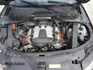 2014 Audi A8 3.0T z VIN WAURGAFD2EN002567, wystawiony jako Copart lot #48188395 z przebiegiem 159 477 mil mil oraz Szkody całkowita. Historia ofert i sprzedaży dostępna na DreamBid. Obrazek 11.