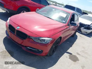 2012 BMW 3 Series 328i with VIN WBA3A5C57CFJ89565, listed as a IAAI auction lot 39130127 with 76,917 mi miles. Bid and sale history available at carsss.com. Image 2.